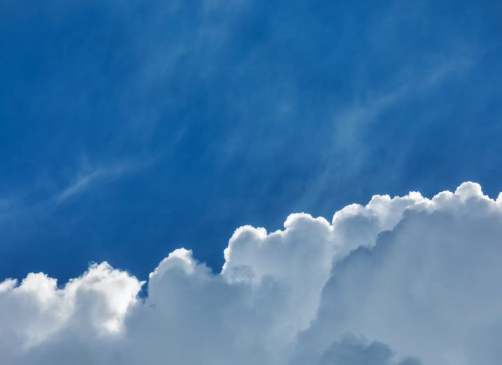 White cloud in the backdrop of a bright blue sky.