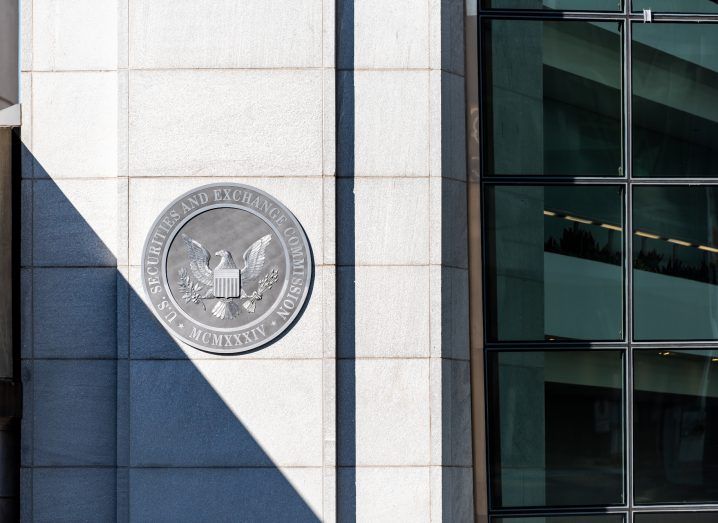 SEC logo on a building wall in the sun.