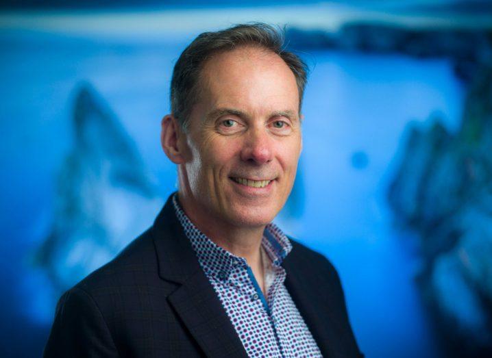 Headshot of DataSolutions managing director in an indoor space.