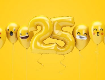 Yellow balloons in the shape of the number 25 flanked by emoji balloons on a yellow background.