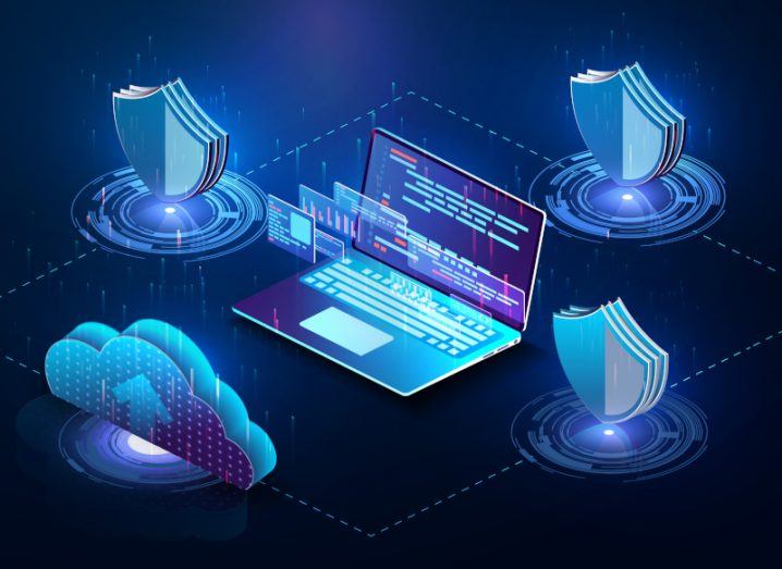 Illustration of a laptop with two shields on each side of it, one shield behind it and a digital cloud in front of it. Used to represent the concept of cybersecurity and cloud technology.