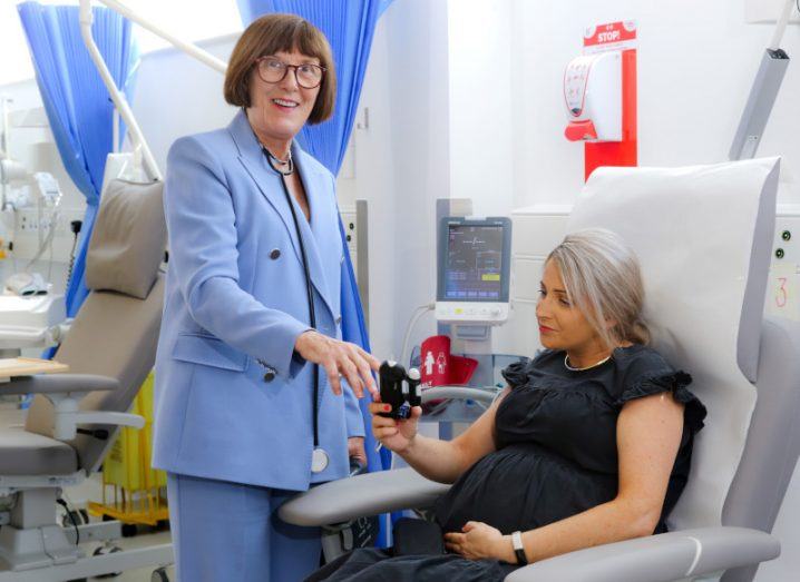 Prof Fidelma Dunne treating a patient who is pregnant on a maternity ward.